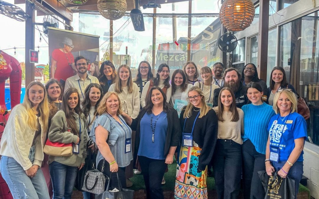 Teacher candidates and faculty members at a luncheon during their trip to the Arkansas Association for Middle Level Education conference in Little Rock.